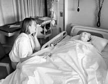 Heidi Miller sobs in a University of Minnesota hospital room after her great grandaunt Ruth Kelly died at age 89. The story of Kelly and her struggle to live independently was powerfully told as part of the "Across Generations" series. Richard Marshall/Pioneer Press